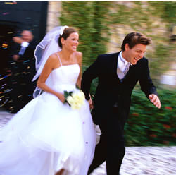 bride and groom running