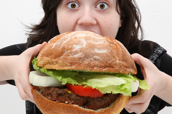 http://blindgossip.com/wp-content/uploads/2011/10/woman-eating-burger.jpg