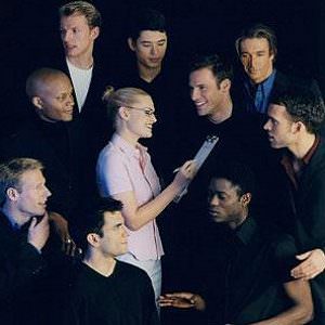 woman surrounded by men