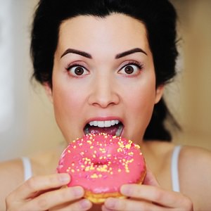 woman eating donut 2